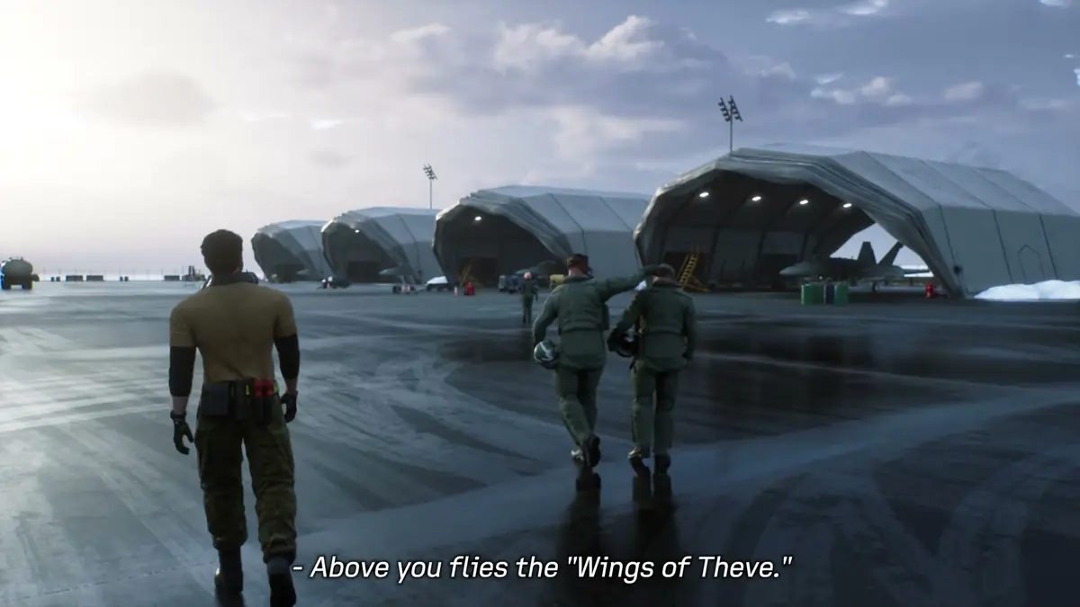 Official ACE COMBAT 8 trailer still of a pilot walking towards hangars on a flight line
