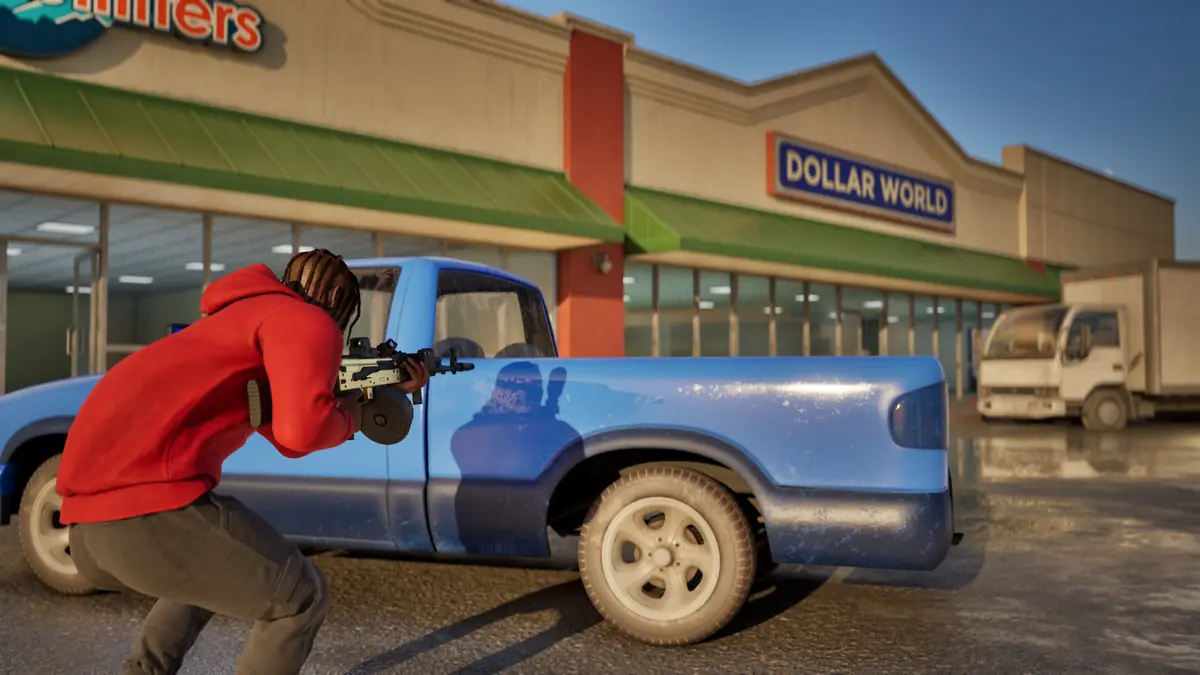 Official Hood Warfare 2 screenshot of a player behind a pickup truck outside storefronts