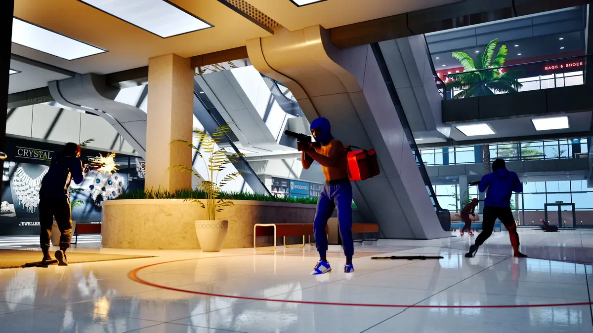 Official Hood Warfare 2 screenshot of several players moving through an indoor shopping-centre interior