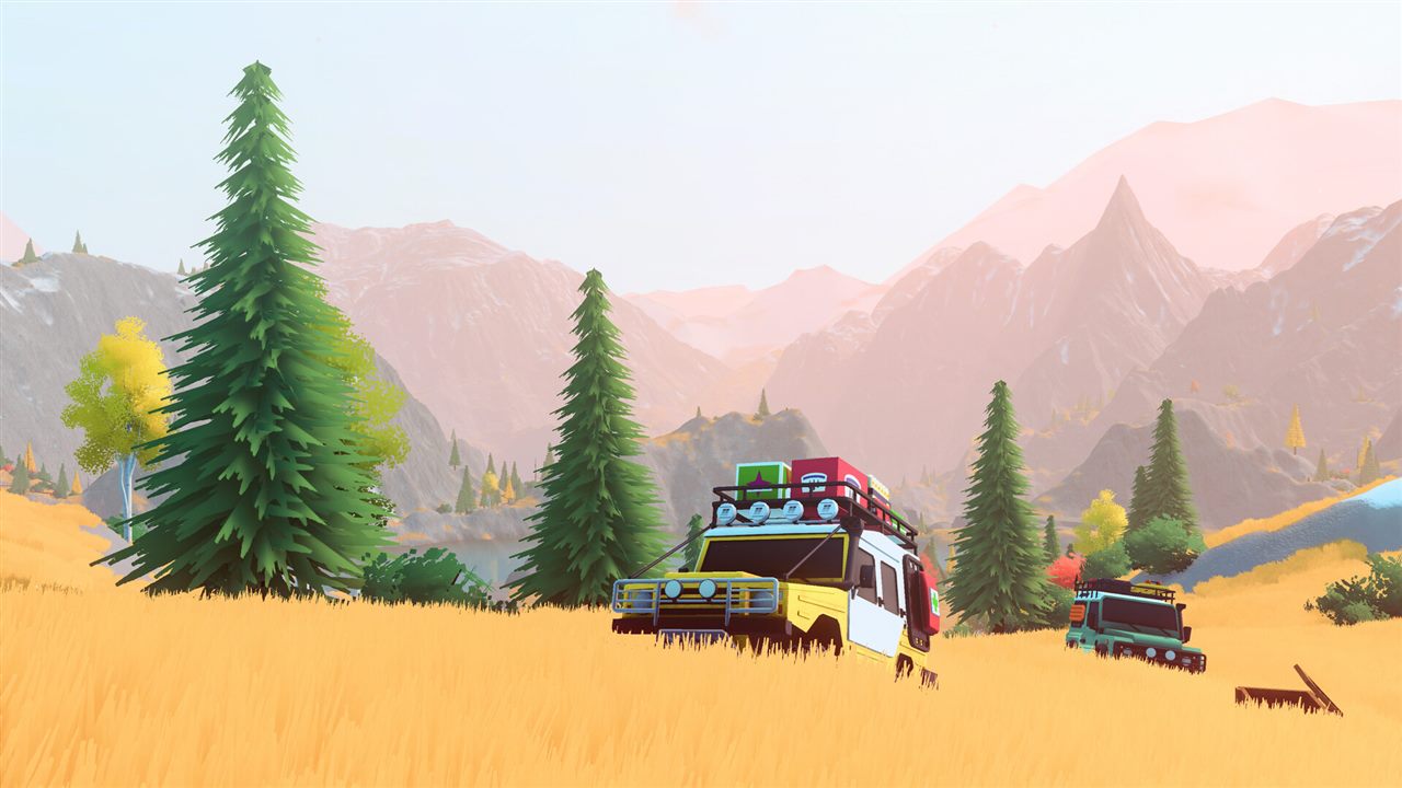 Official over the hill screenshot showing two equipped off-road vehicles in a Canadian mountain valley