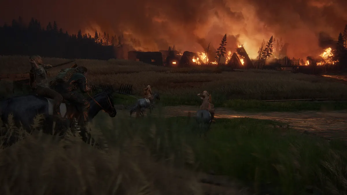 A burning settlement in The Last of Us Part II Remastered