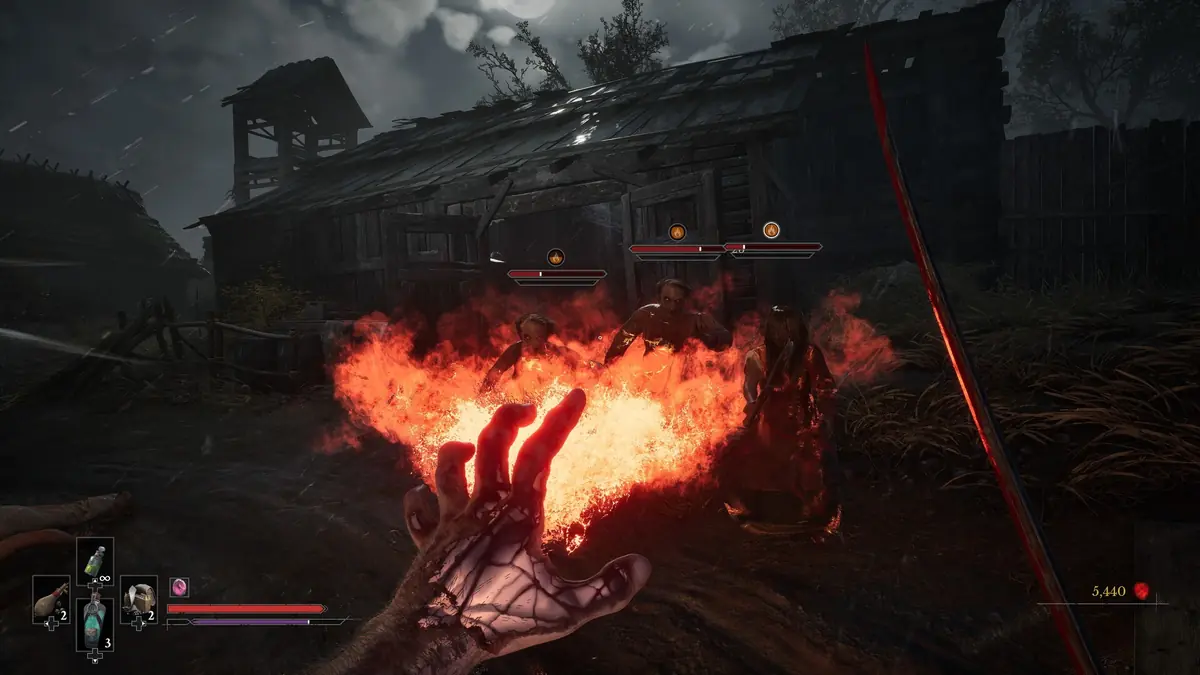 Official Valor Mortis screenshot of a night scene lit by fire and embers