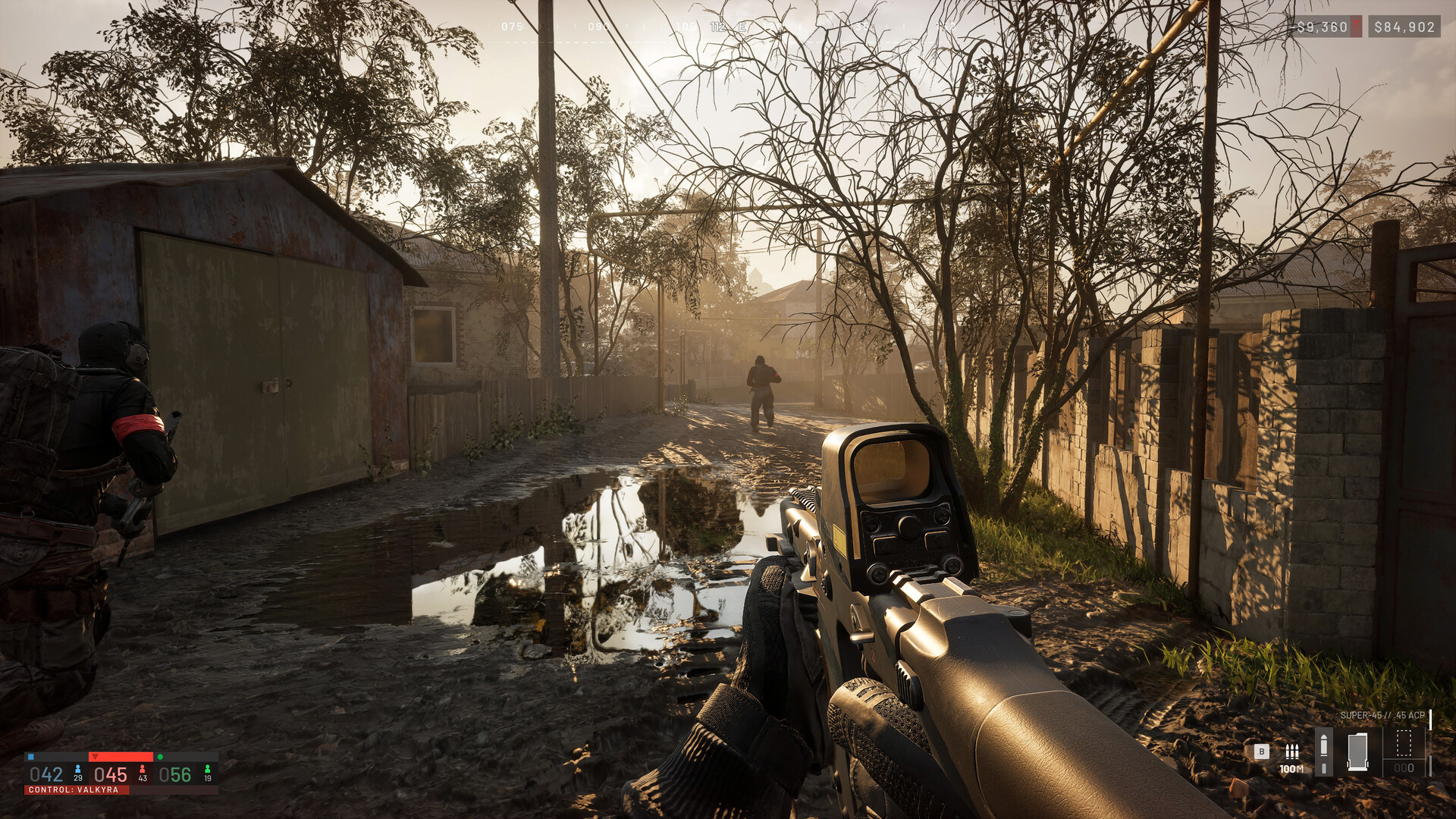 Official WARDOGS screenshot from first person on a village street with the on-screen control indicator reading CONTROL: VALKYRA